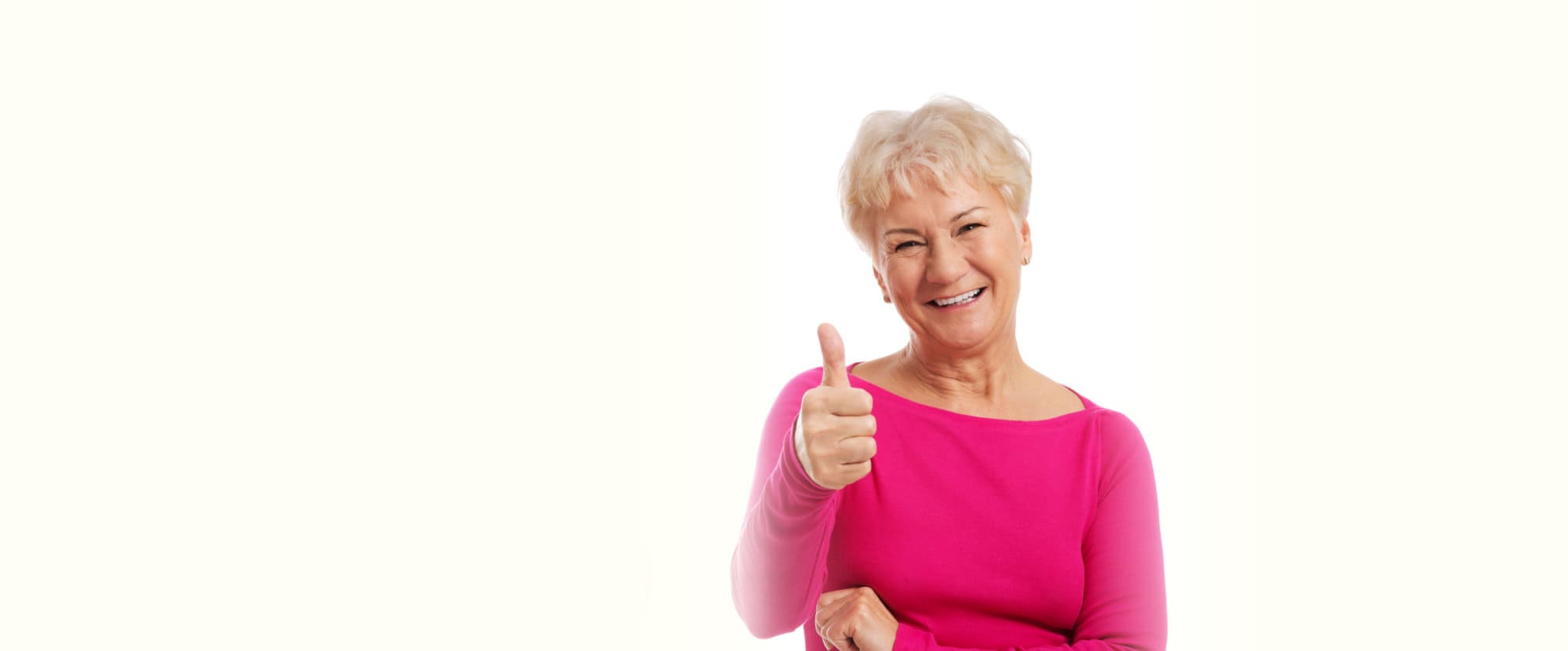 old woman showing her thumbs up